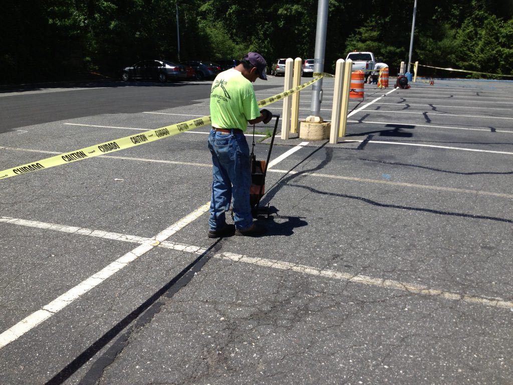 Regular maintenance of parking lots is essential to prevent accidents and create a smooth traffic flow